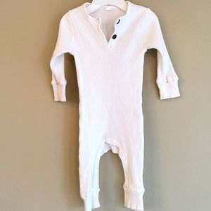 White snug fitting ribbed footless sleeper/footie